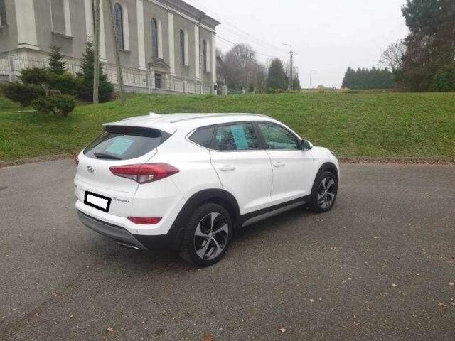 Білий Хендай Туксон, об'ємом двигуна 1.6 л та пробігом 85 тис. км за 10600 $, фото 5 на Automoto.ua