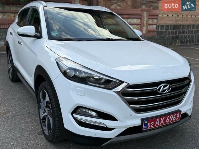Белый Хендай Туксон, объемом двигателя 2 л и пробегом 149 тыс. км за 20990 $, фото 16 на Automoto.ua