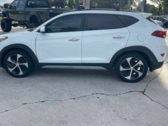 Білий Хендай Туксон, об'ємом двигуна 1.6 л та пробігом 40 тис. км за 12100 $, фото 4 на Automoto.ua