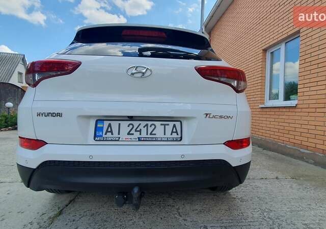 Білий Хендай Туксон, об'ємом двигуна 1.69 л та пробігом 227 тис. км за 18600 $, фото 6 на Automoto.ua