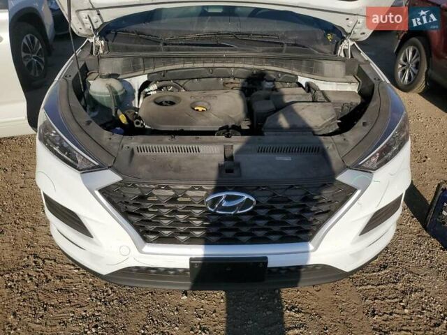 Белый Хендай Туксон, объемом двигателя 2 л и пробегом 105 тыс. км за 4900 $, фото 10 на Automoto.ua