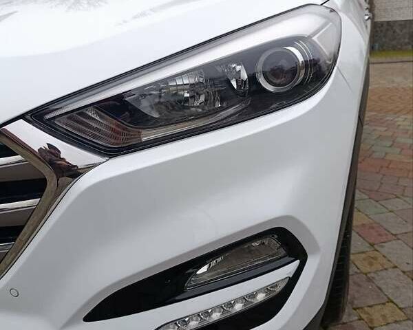 Білий Хендай Туксон, об'ємом двигуна 2 л та пробігом 169 тис. км за 19999 $, фото 42 на Automoto.ua