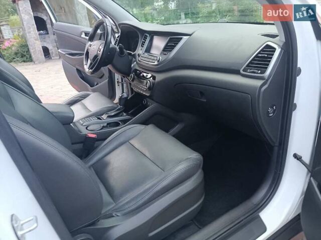 Білий Хендай Туксон, об'ємом двигуна 2 л та пробігом 169 тис. км за 19999 $, фото 94 на Automoto.ua