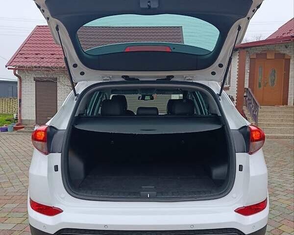 Білий Хендай Туксон, об'ємом двигуна 2 л та пробігом 169 тис. км за 19999 $, фото 24 на Automoto.ua