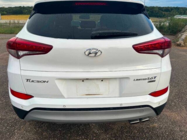 Белый Хендай Туксон, объемом двигателя 1.6 л и пробегом 48 тыс. км за 9200 $, фото 6 на Automoto.ua