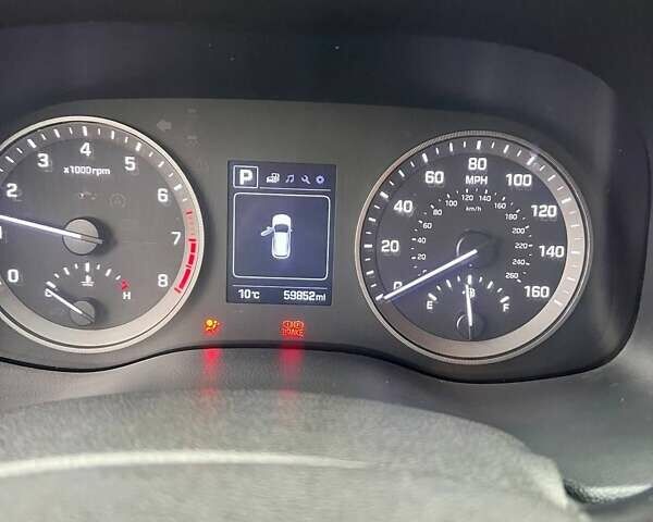 Белый Хендай Туксон, объемом двигателя 2 л и пробегом 96 тыс. км за 16900 $, фото 1 на Automoto.ua