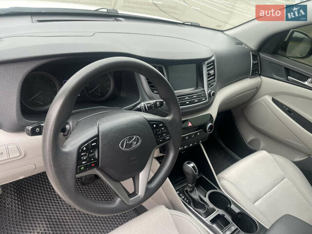 Белый Хендай Туксон, объемом двигателя 2 л и пробегом 91 тыс. км за 15900 $, фото 10 на Automoto.ua