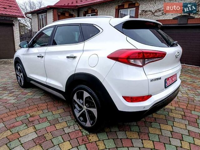Білий Хендай Туксон, об'ємом двигуна 2 л та пробігом 169 тис. км за 19999 $, фото 4 на Automoto.ua