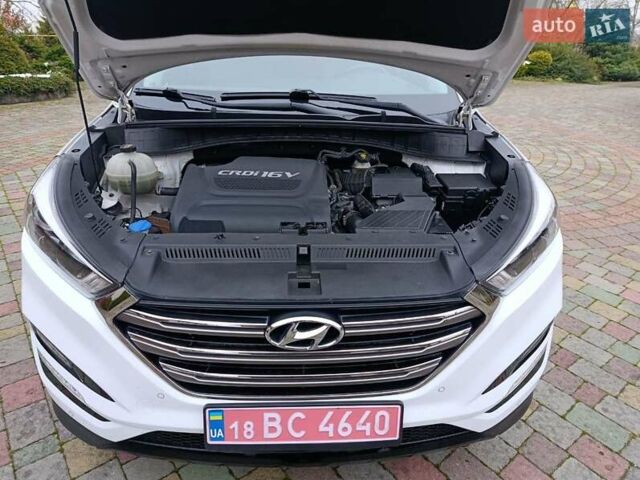 Білий Хендай Туксон, об'ємом двигуна 2 л та пробігом 169 тис. км за 19999 $, фото 64 на Automoto.ua