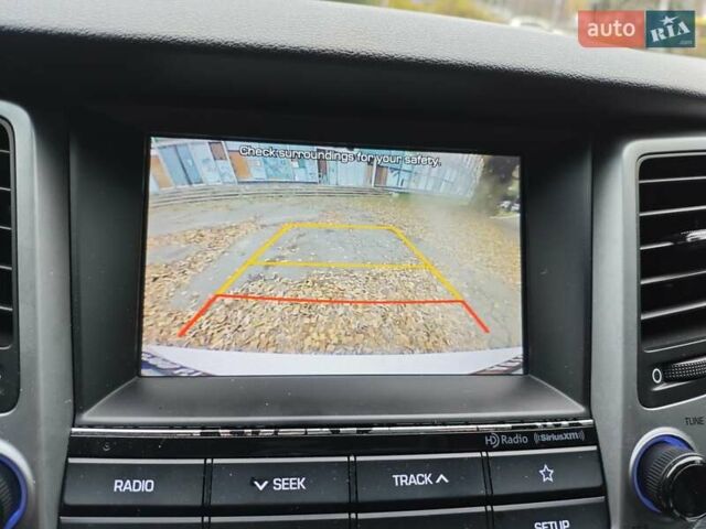 Белый Хендай Туксон, объемом двигателя 2.36 л и пробегом 75 тыс. км за 16700 $, фото 27 на Automoto.ua