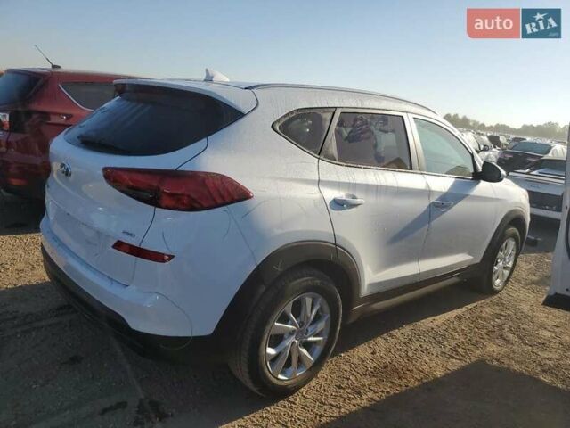 Белый Хендай Туксон, объемом двигателя 2 л и пробегом 105 тыс. км за 4900 $, фото 2 на Automoto.ua