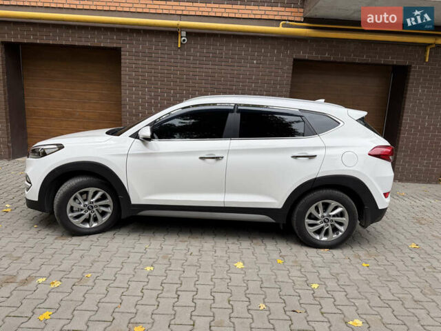 Білий Хендай Туксон, об'ємом двигуна 2 л та пробігом 77 тис. км за 21700 $, фото 10 на Automoto.ua