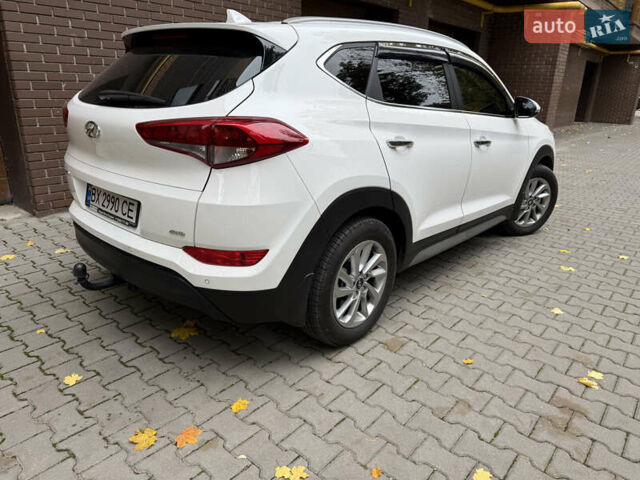 Білий Хендай Туксон, об'ємом двигуна 2 л та пробігом 77 тис. км за 21700 $, фото 9 на Automoto.ua