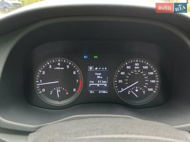 Белый Хендай Туксон, объемом двигателя 2.36 л и пробегом 75 тыс. км за 16700 $, фото 23 на Automoto.ua