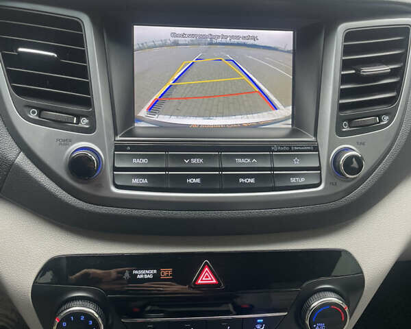 Белый Хендай Туксон, объемом двигателя 2 л и пробегом 91 тыс. км за 15900 $, фото 32 на Automoto.ua