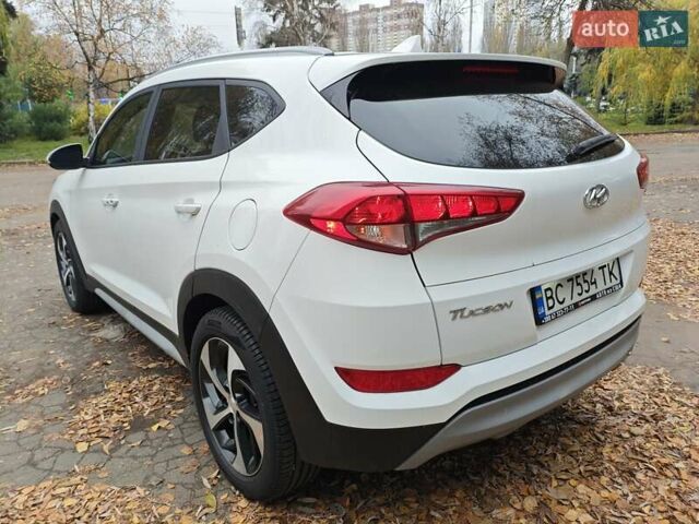 Белый Хендай Туксон, объемом двигателя 2.36 л и пробегом 75 тыс. км за 16700 $, фото 7 на Automoto.ua