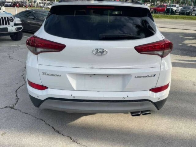 Білий Хендай Туксон, об'ємом двигуна 1.6 л та пробігом 40 тис. км за 12100 $, фото 6 на Automoto.ua