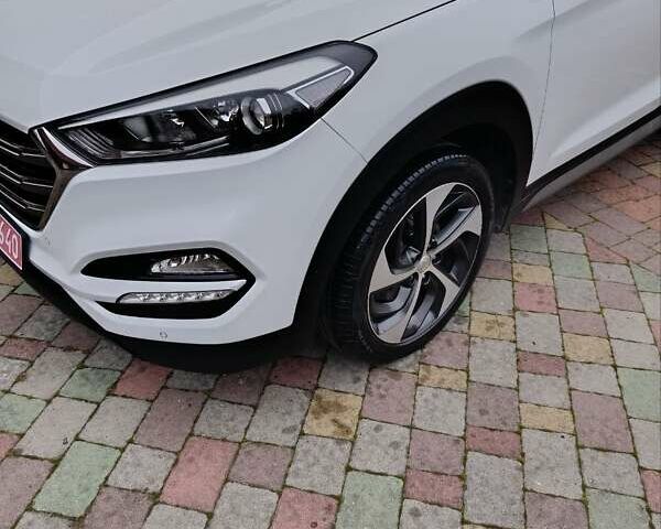 Білий Хендай Туксон, об'ємом двигуна 2 л та пробігом 169 тис. км за 19999 $, фото 55 на Automoto.ua