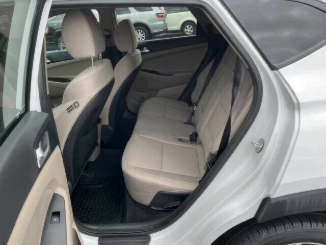 Белый Хендай Туксон, объемом двигателя 2.4 л и пробегом 34 тыс. км за 9100 $, фото 9 на Automoto.ua