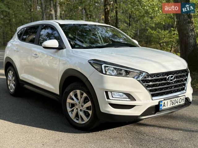 Білий Хендай Туксон, об'ємом двигуна 2 л та пробігом 51 тис. км за 17900 $, фото 4 на Automoto.ua