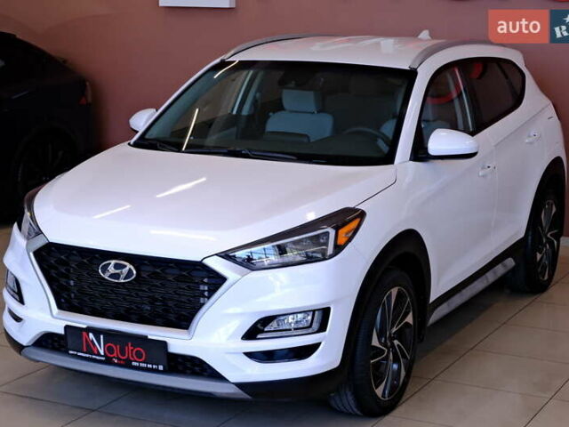 Белый Хендай Туксон, объемом двигателя 2.4 л и пробегом 63 тыс. км за 19500 $, фото 3 на Automoto.ua