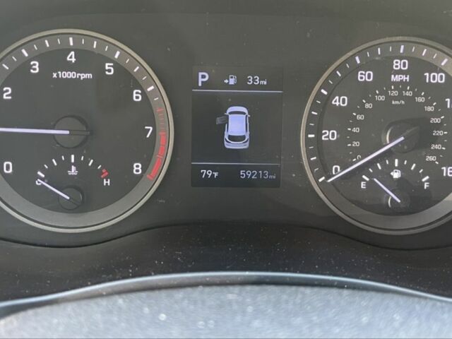 Белый Хендай Туксон, объемом двигателя 2 л и пробегом 95 тыс. км за 14500 $, фото 6 на Automoto.ua