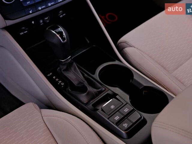 Белый Хендай Туксон, объемом двигателя 2.4 л и пробегом 63 тыс. км за 19500 $, фото 24 на Automoto.ua