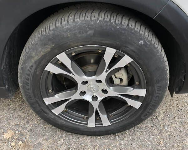 Белый Хендай Туксон, объемом двигателя 2 л и пробегом 25 тыс. км за 15900 $, фото 30 на Automoto.ua