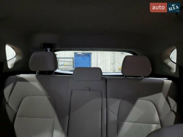 Белый Хендай Туксон, объемом двигателя 2 л и пробегом 97 тыс. км за 4400 $, фото 9 на Automoto.ua