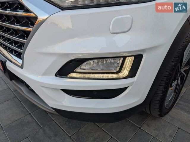 Білий Хендай Туксон, об'ємом двигуна 1.6 л та пробігом 152 тис. км за 21950 $, фото 28 на Automoto.ua
