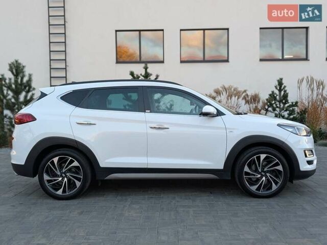 Білий Хендай Туксон, об'ємом двигуна 1.6 л та пробігом 152 тис. км за 21950 $, фото 4 на Automoto.ua