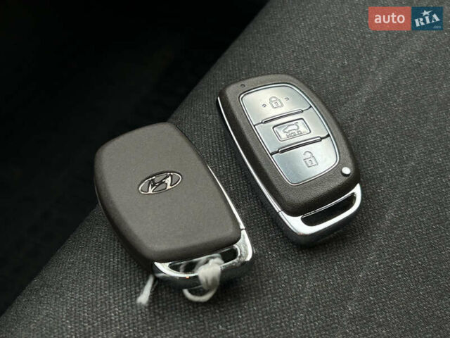 Білий Хендай Туксон, об'ємом двигуна 2 л та пробігом 101 тис. км за 17800 $, фото 21 на Automoto.ua