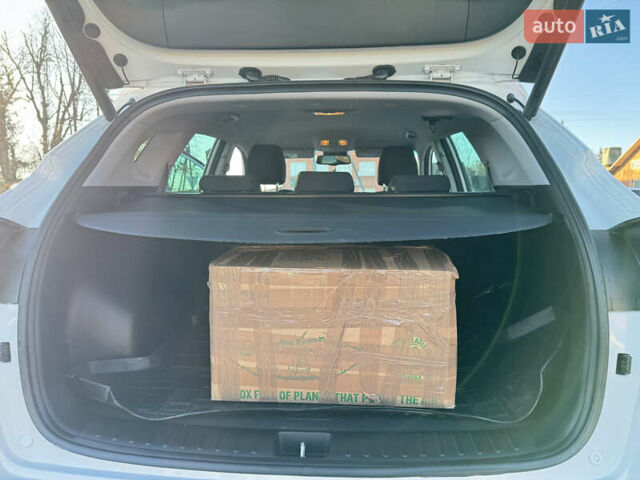 Белый Хендай Туксон, объемом двигателя 2 л и пробегом 270 тыс. км за 19800 $, фото 14 на Automoto.ua