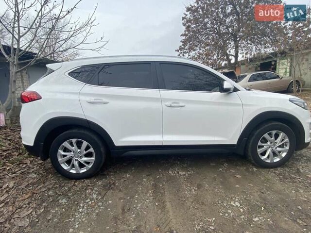 Білий Хендай Туксон, об'ємом двигуна 2 л та пробігом 40 тис. км за 20700 $, фото 8 на Automoto.ua