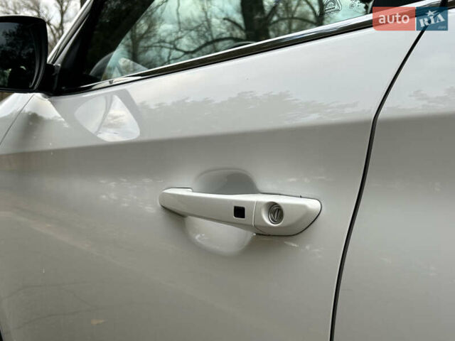 Білий Хендай Туксон, об'ємом двигуна 2 л та пробігом 101 тис. км за 17800 $, фото 17 на Automoto.ua