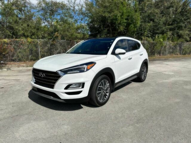 Белый Хендай Туксон, объемом двигателя 2.4 л и пробегом 36 тыс. км за 11400 $, фото 2 на Automoto.ua