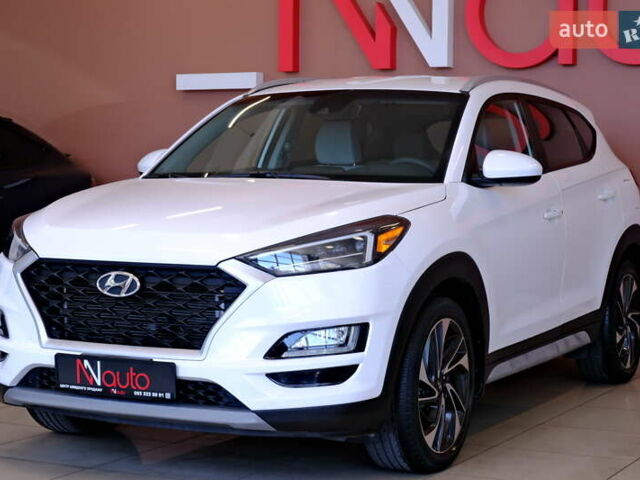 Белый Хендай Туксон, объемом двигателя 2.4 л и пробегом 63 тыс. км за 19500 $, фото 4 на Automoto.ua