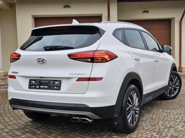 Білий Хендай Туксон, об'ємом двигуна 2 л та пробігом 79 тис. км за 12100 $, фото 3 на Automoto.ua