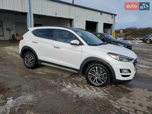 Белый Хендай Туксон, объемом двигателя 2.4 л и пробегом 20 тыс. км за 4100 $, фото 3 на Automoto.ua