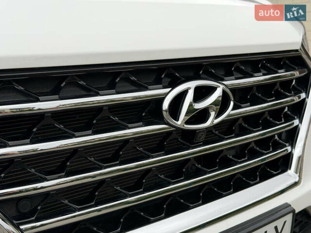 Белый Хендай Туксон, объемом двигателя 2 л и пробегом 50 тыс. км за 23800 $, фото 49 на Automoto.ua