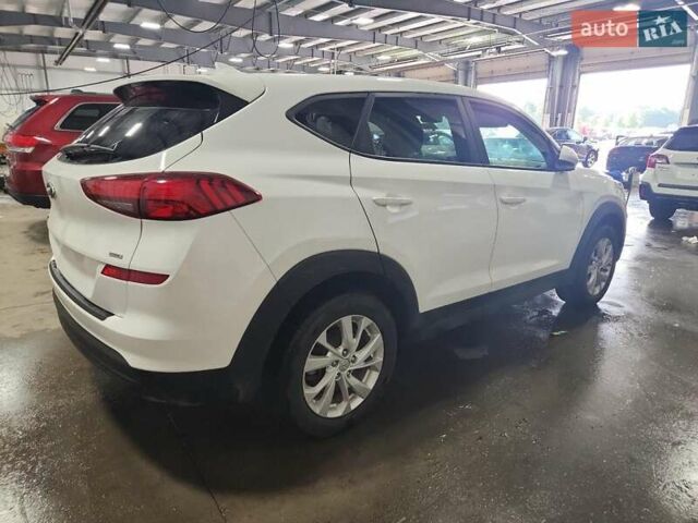 Белый Хендай Туксон, объемом двигателя 2 л и пробегом 85 тыс. км за 4300 $, фото 2 на Automoto.ua