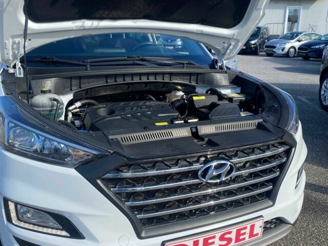 Белый Хендай Туксон, объемом двигателя 1.6 л и пробегом 77 тыс. км за 15700 $, фото 3 на Automoto.ua