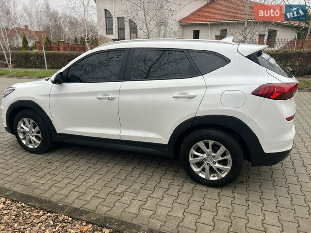 Білий Хендай Туксон, об'ємом двигуна 2 л та пробігом 136 тис. км за 22900 $, фото 5 на Automoto.ua