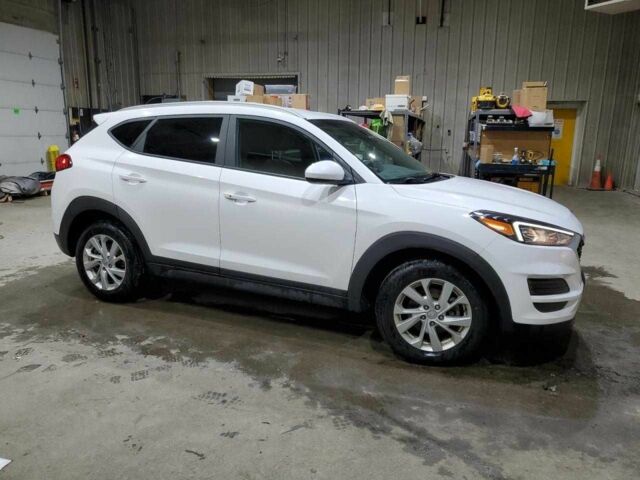 Белый Хендай Туксон, объемом двигателя 2 л и пробегом 97 тыс. км за 2900 $, фото 3 на Automoto.ua