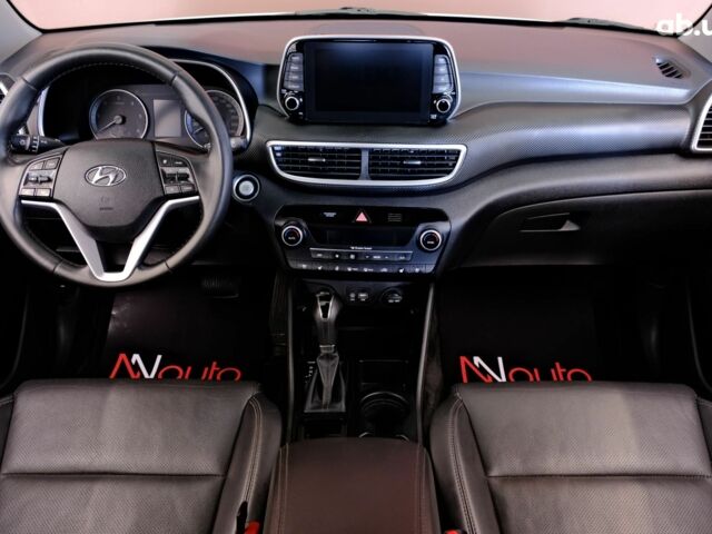 Белый Хендай Туксон, объемом двигателя 2 л и пробегом 134 тыс. км за 23500 $, фото 6 на Automoto.ua