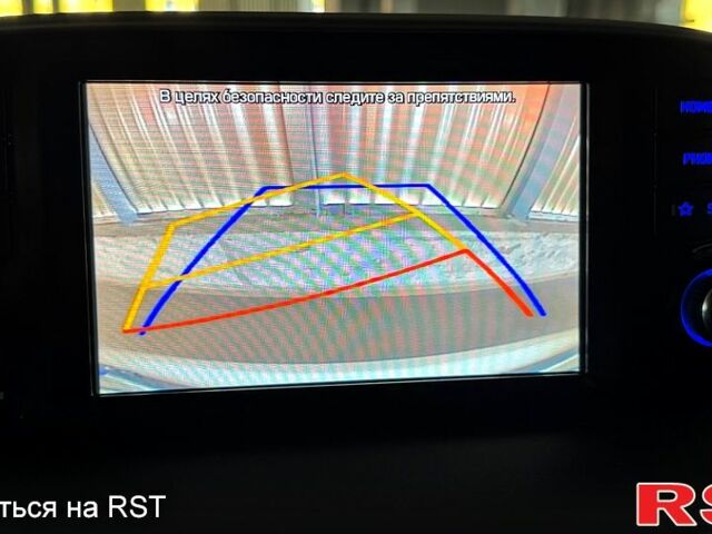 Белый Хендай Туксон, объемом двигателя 2 л и пробегом 50 тыс. км за 21900 $, фото 2 на Automoto.ua