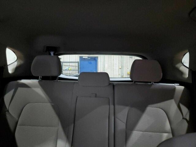 Білий Хендай Туксон, об'ємом двигуна 2 л та пробігом 100 тис. км за 6900 $, фото 9 на Automoto.ua