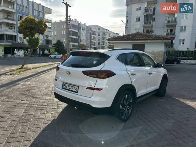 Белый Хендай Туксон, объемом двигателя 2 л и пробегом 50 тыс. км за 22500 $, фото 4 на Automoto.ua