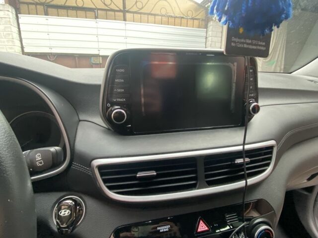 Білий Хендай Туксон, об'ємом двигуна 2 л та пробігом 50 тис. км за 21999 $, фото 14 на Automoto.ua