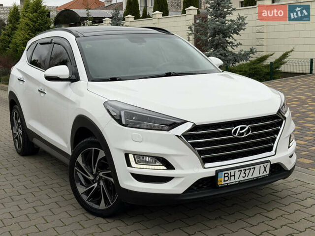 Белый Хендай Туксон, объемом двигателя 2 л и пробегом 50 тыс. км за 23800 $, фото 9 на Automoto.ua